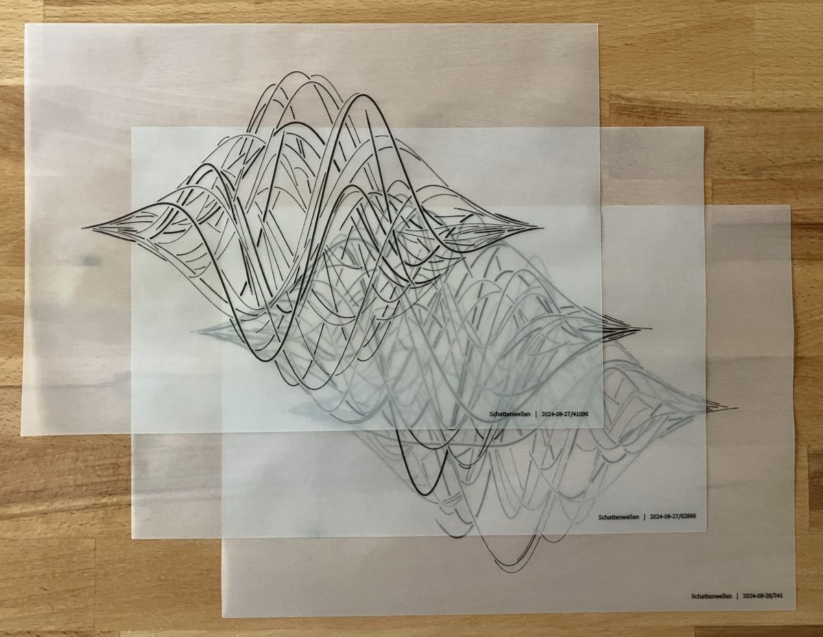 Three A4 sheets of tracing paper with different versions of the generative wavy shapes plotted in black ink.